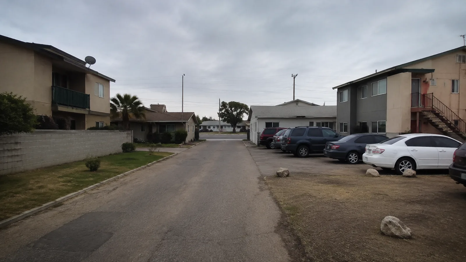 Apartment buildings and small houses on a block in Federal Heights, CO