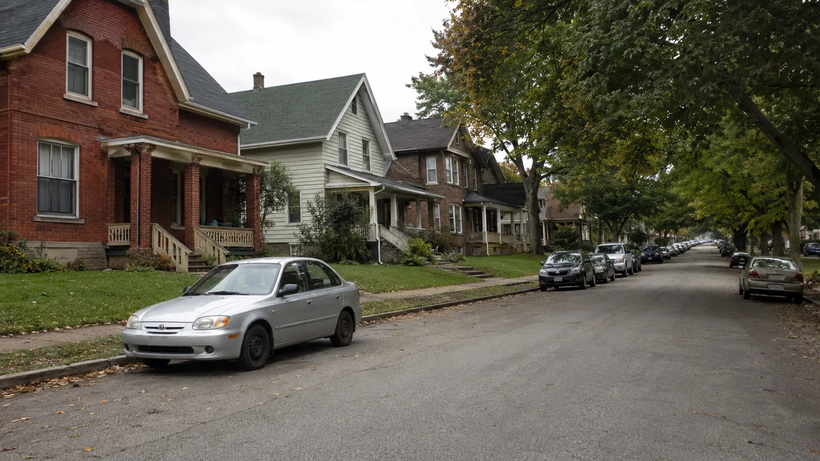 Early twentieth century and 1990s houses on a tree lined street in Louisville, CO