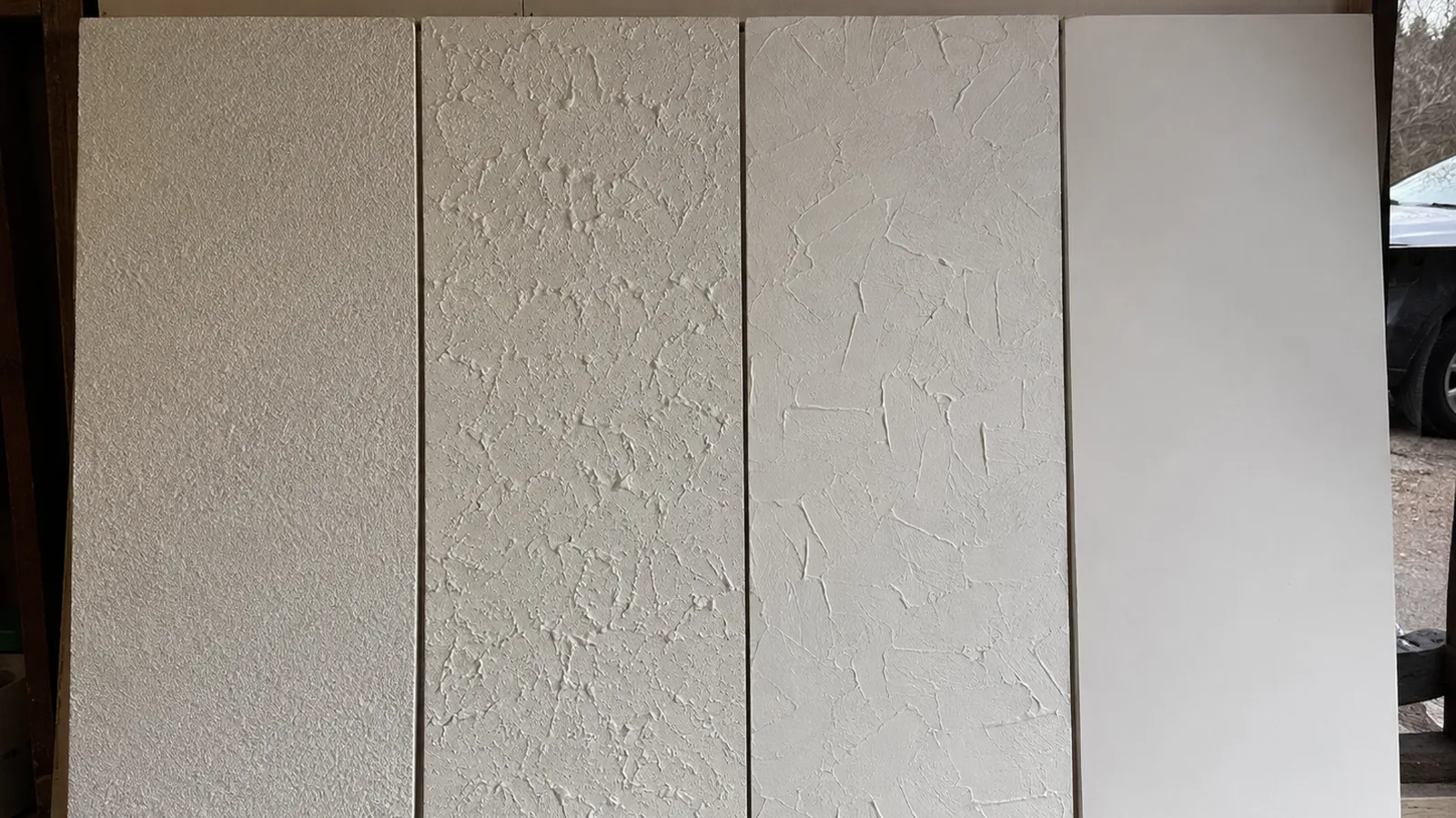 Four wall panels showing orange peel, knockdown, skip trowel and smooth drywall texture side by side